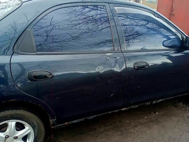 Синий Мазда 323, объемом двигателя 1.5 л и пробегом 500 тыс. км за 1500 $, фото 1 на Automoto.ua