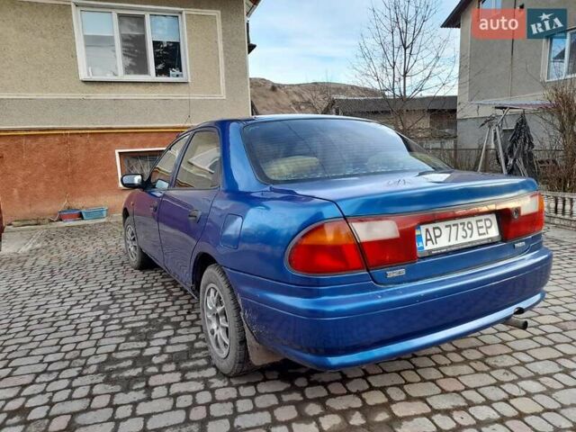 Синій Мазда 323, об'ємом двигуна 1.8 л та пробігом 238 тис. км за 3200 $, фото 7 на Automoto.ua