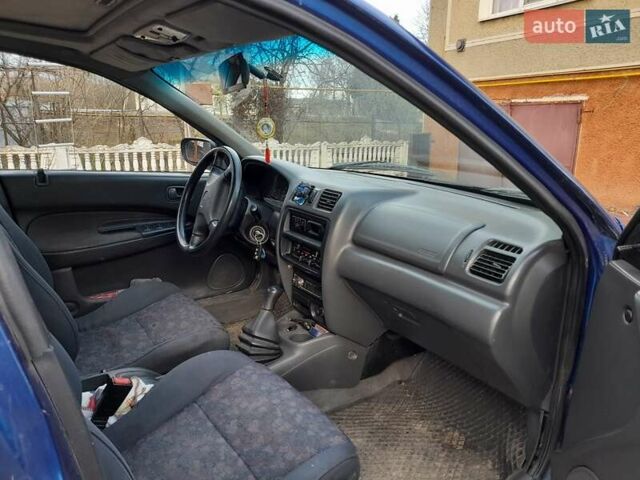 Синій Мазда 323, об'ємом двигуна 1.8 л та пробігом 238 тис. км за 3200 $, фото 5 на Automoto.ua