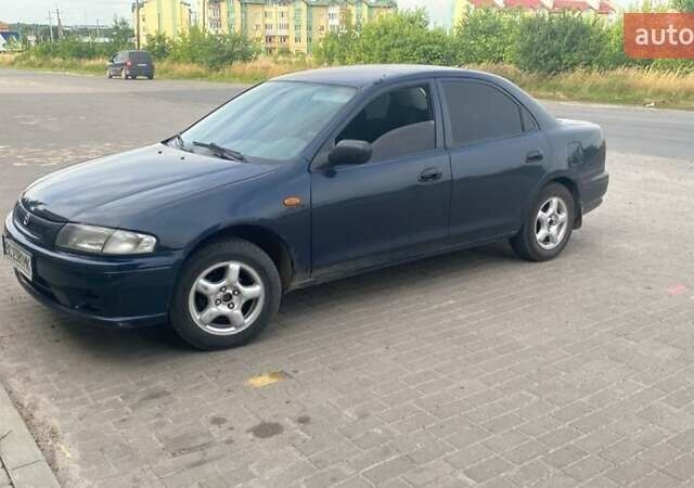 Синий Мазда 323, объемом двигателя 1.5 л и пробегом 430 тыс. км за 2200 $, фото 3 на Automoto.ua