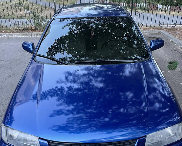 Синий Мазда 323, объемом двигателя 1.49 л и пробегом 339 тыс. км за 2300 $, фото 1 на Automoto.ua