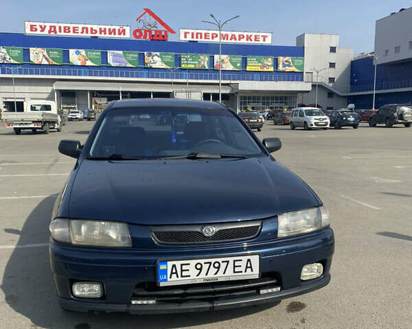 Синий Мазда 323, объемом двигателя 1.5 л и пробегом 330 тыс. км за 3000 $, фото 17 на Automoto.ua