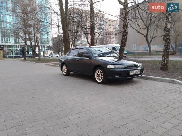 Синій Мазда 323, об'ємом двигуна 1.5 л та пробігом 309 тис. км за 2750 $, фото 14 на Automoto.ua