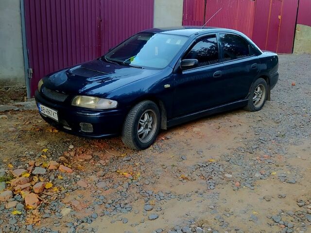 Синій Мазда 323, об'ємом двигуна 1.5 л та пробігом 0 тис. км за 1500 $, фото 4 на Automoto.ua