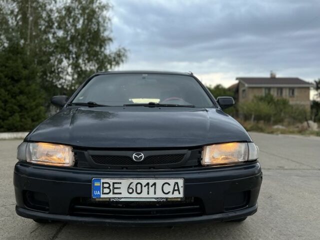 Синий Мазда 323, объемом двигателя 1.5 л и пробегом 200 тыс. км за 1250 $, фото 6 на Automoto.ua