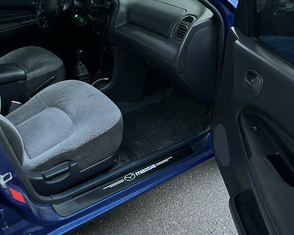 Синий Мазда 323, объемом двигателя 1.49 л и пробегом 339 тыс. км за 2300 $, фото 9 на Automoto.ua