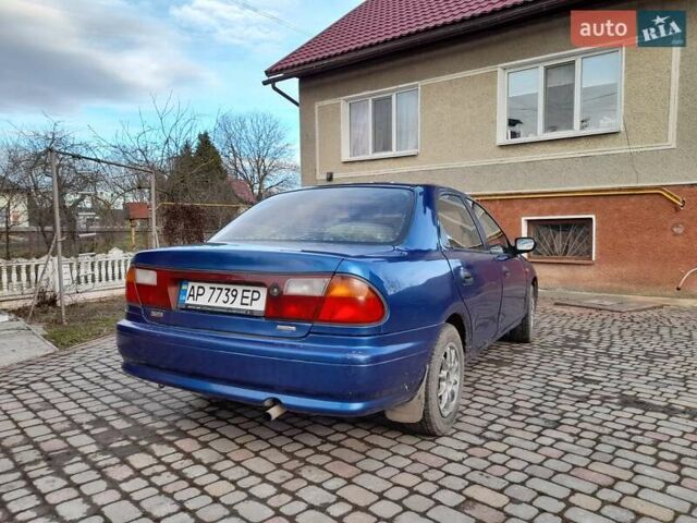 Синій Мазда 323, об'ємом двигуна 1.8 л та пробігом 238 тис. км за 3200 $, фото 6 на Automoto.ua