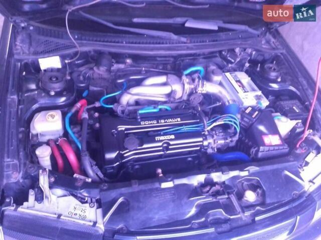Синій Мазда 323, об'ємом двигуна 1.5 л та пробігом 309 тис. км за 2750 $, фото 9 на Automoto.ua