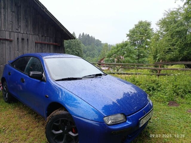 Синий Мазда 323, объемом двигателя 1.5 л и пробегом 378 тыс. км за 2300 $, фото 1 на Automoto.ua