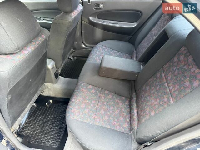 Синій Мазда 323, об'ємом двигуна 1.5 л та пробігом 200 тис. км за 1750 $, фото 15 на Automoto.ua