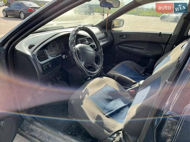 Синий Мазда 323, объемом двигателя 1.5 л и пробегом 471 тыс. км за 2500 $, фото 10 на Automoto.ua