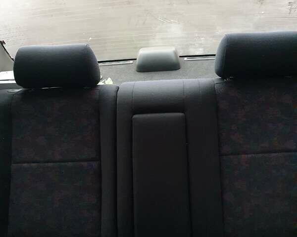 Синий Мазда 323, объемом двигателя 1.84 л и пробегом 299 тыс. км за 2000 $, фото 3 на Automoto.ua