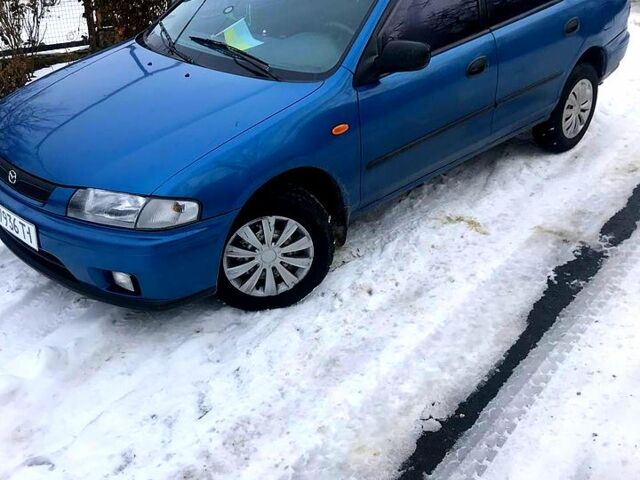 Синій Мазда 323, об'ємом двигуна 1.5 л та пробігом 300 тис. км за 2700 $, фото 1 на Automoto.ua