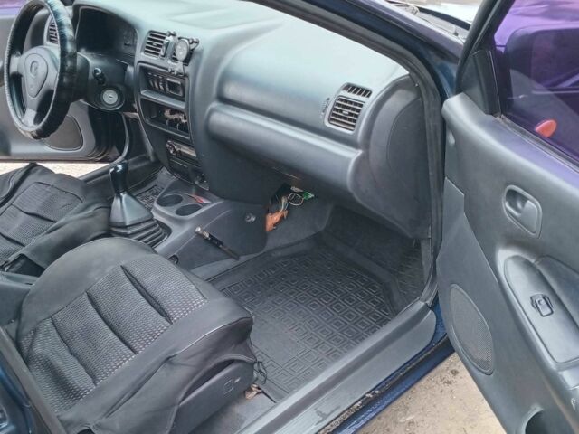 Синий Мазда 323, объемом двигателя 1.5 л и пробегом 74 тыс. км за 1950 $, фото 9 на Automoto.ua