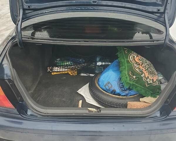 Синий Мазда 323, объемом двигателя 1.84 л и пробегом 299 тыс. км за 2000 $, фото 13 на Automoto.ua