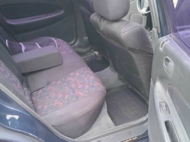 Синий Мазда 323, объемом двигателя 1.5 л и пробегом 74 тыс. км за 1950 $, фото 10 на Automoto.ua