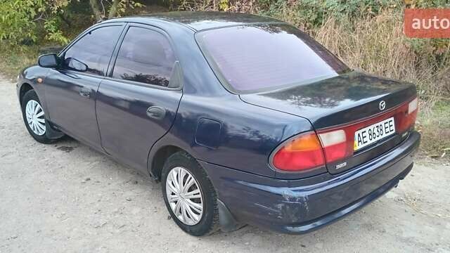 Синій Мазда 323, об'ємом двигуна 1.5 л та пробігом 70 тис. км за 1950 $, фото 2 на Automoto.ua