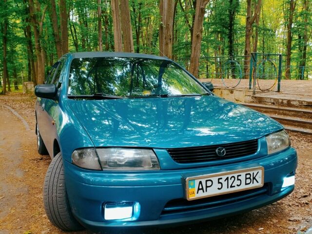 Синій Мазда 323, об'ємом двигуна 1.8 л та пробігом 340 тис. км за 2200 $, фото 10 на Automoto.ua