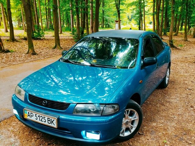 Синій Мазда 323, об'ємом двигуна 1.8 л та пробігом 340 тис. км за 2200 $, фото 11 на Automoto.ua