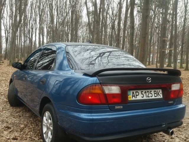 Синій Мазда 323, об'ємом двигуна 1.8 л та пробігом 340 тис. км за 2200 $, фото 4 на Automoto.ua