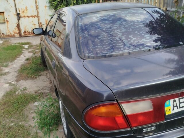 Синий Мазда 323, объемом двигателя 1.5 л и пробегом 400 тыс. км за 2574 $, фото 3 на Automoto.ua