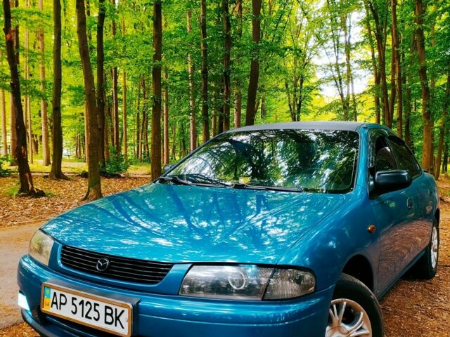 Синій Мазда 323, об'ємом двигуна 1.8 л та пробігом 340 тис. км за 2200 $, фото 12 на Automoto.ua