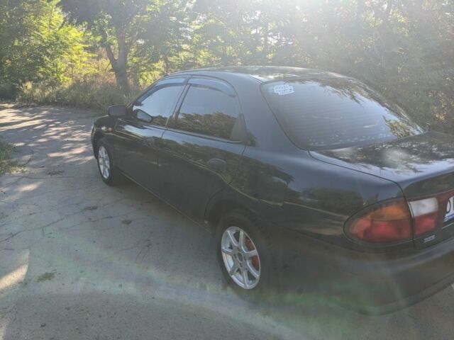 Синий Мазда 323, объемом двигателя 0 л и пробегом 202 тыс. км за 2600 $, фото 4 на Automoto.ua