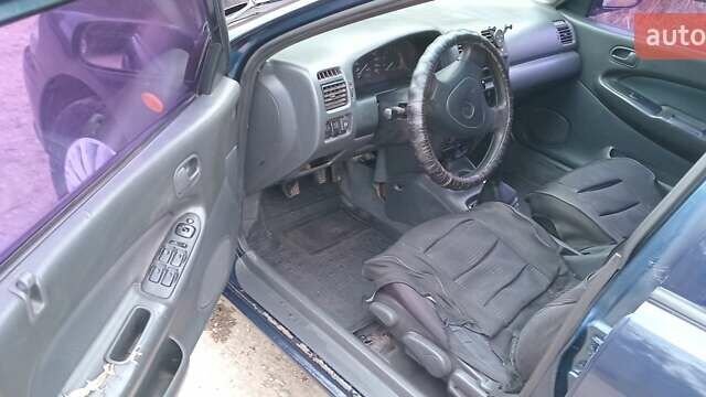Синій Мазда 323, об'ємом двигуна 1.5 л та пробігом 70 тис. км за 1950 $, фото 6 на Automoto.ua