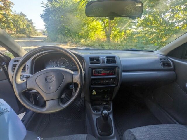 Синий Мазда 323, объемом двигателя 0 л и пробегом 202 тыс. км за 2600 $, фото 8 на Automoto.ua