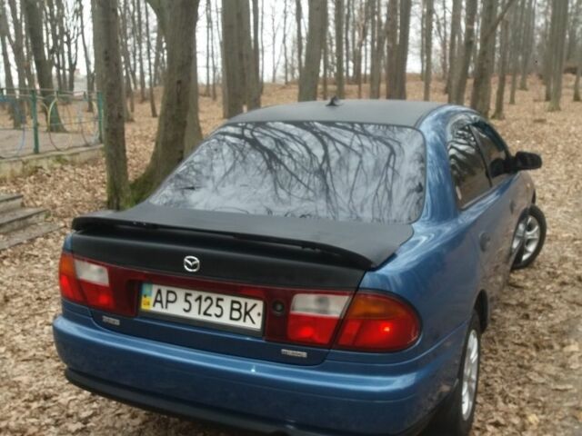 Синій Мазда 323, об'ємом двигуна 1.8 л та пробігом 340 тис. км за 2200 $, фото 3 на Automoto.ua