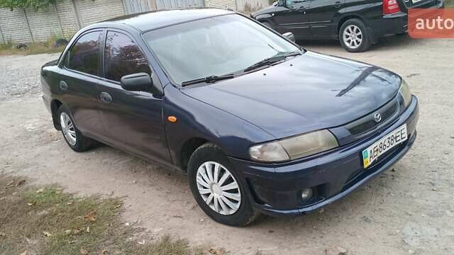 Синій Мазда 323, об'ємом двигуна 1.5 л та пробігом 70 тис. км за 1950 $, фото 5 на Automoto.ua