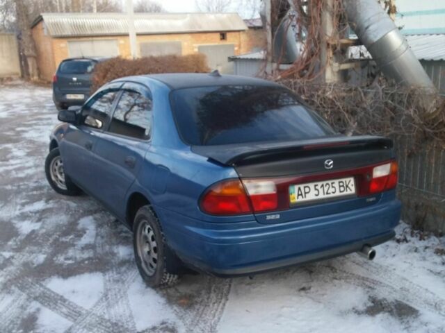Синій Мазда 323, об'ємом двигуна 1.8 л та пробігом 340 тис. км за 2200 $, фото 2 на Automoto.ua