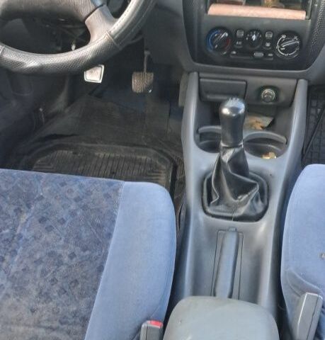 Синий Мазда 323, объемом двигателя 2 л и пробегом 310 тыс. км за 800 $, фото 8 на Automoto.ua