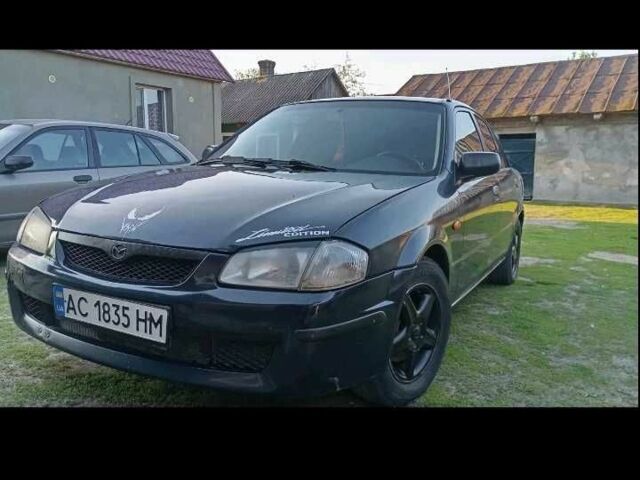 Синий Мазда 323, объемом двигателя 1.8 л и пробегом 257 тыс. км за 700 $, фото 1 на Automoto.ua