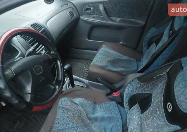 Синий Мазда 323, объемом двигателя 1.5 л и пробегом 280 тыс. км за 2700 $, фото 5 на Automoto.ua