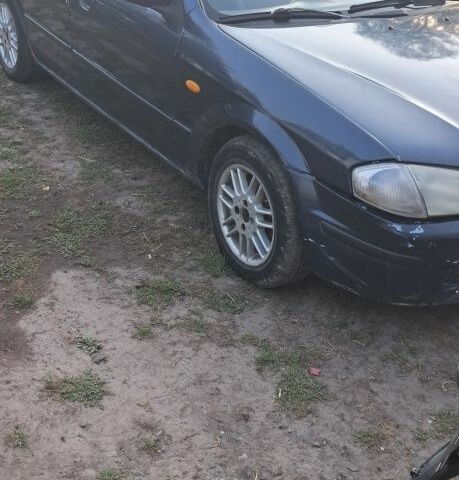 Синий Мазда 323, объемом двигателя 2 л и пробегом 310 тыс. км за 800 $, фото 12 на Automoto.ua