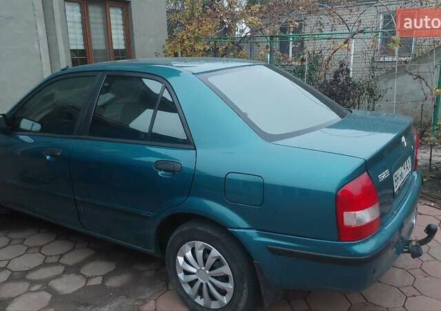 Синий Мазда 323, объемом двигателя 1.5 л и пробегом 280 тыс. км за 2700 $, фото 1 на Automoto.ua