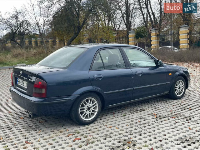 Мазда 323 1999 в Тульчине на Automoto.ua Синий Мазда 323, объемом двигателя 2 л и пробегом 310 тыс. км за 2300 $, фото 2 на Automoto.ua