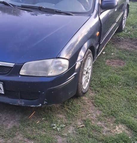 Синий Мазда 323, объемом двигателя 2 л и пробегом 310 тыс. км за 800 $, фото 10 на Automoto.ua