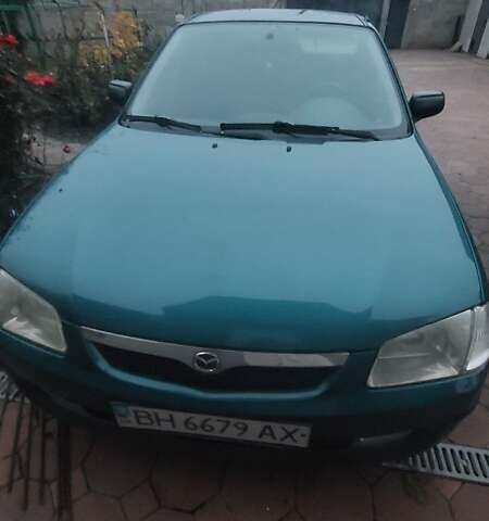 Синий Мазда 323, объемом двигателя 1.5 л и пробегом 280 тыс. км за 2700 $, фото 3 на Automoto.ua