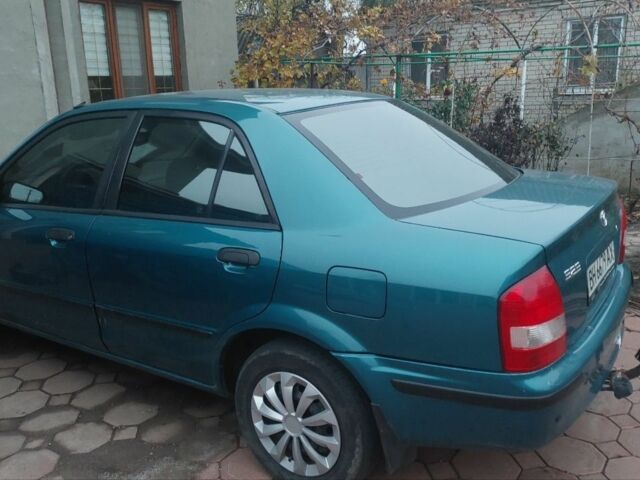 Синий Мазда 323, объемом двигателя 1.5 л и пробегом 280 тыс. км за 2700 $, фото 3 на Automoto.ua
