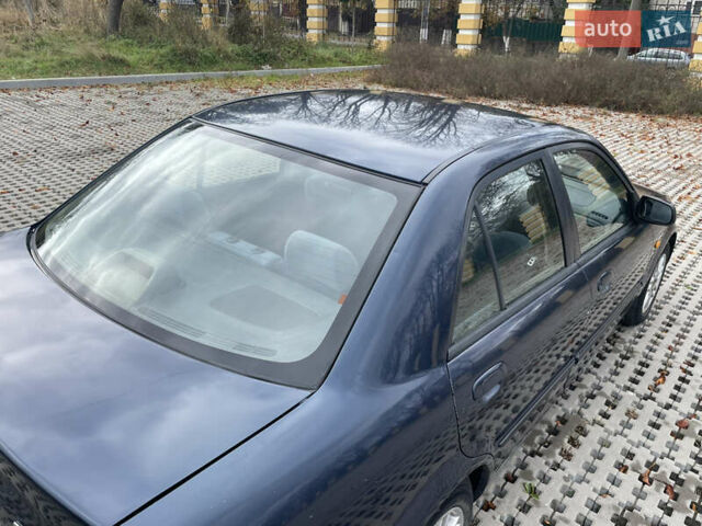 Синий Мазда 323, объемом двигателя 2 л и пробегом 310 тыс. км за 2400 $, фото 7 на Automoto.ua