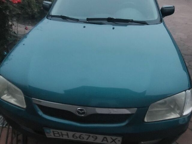 Синий Мазда 323, объемом двигателя 1.5 л и пробегом 280 тыс. км за 2700 $, фото 6 на Automoto.ua