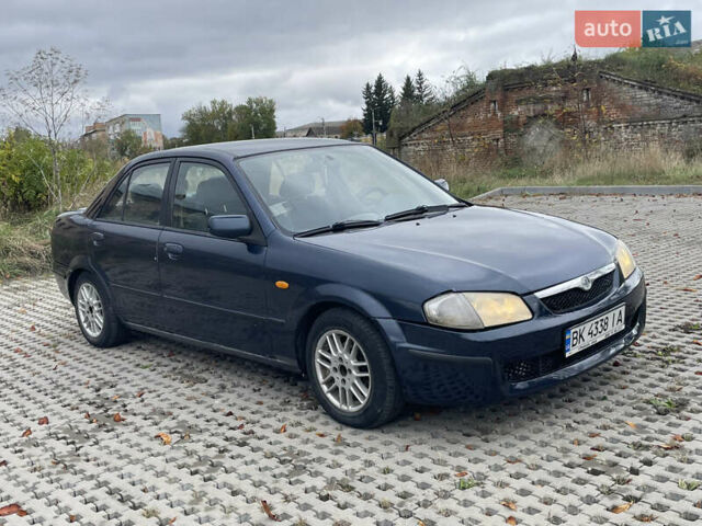 Синий Мазда 323, объемом двигателя 2 л и пробегом 310 тыс. км за 2400 $, фото 2 на Automoto.ua