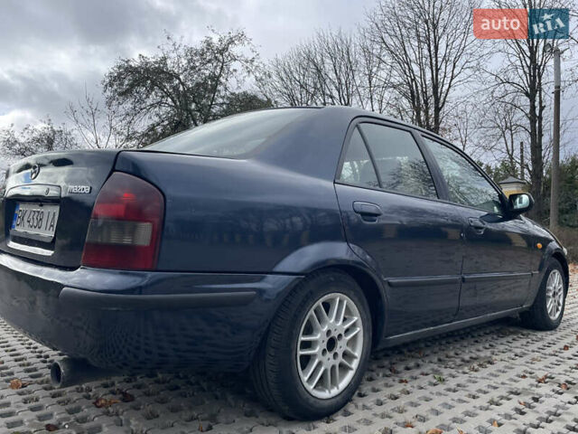 Мазда 323 1999 в Тульчине на Automoto.ua Синий Мазда 323, объемом двигателя 2 л и пробегом 310 тыс. км за 2300 $, фото 6 на Automoto.ua