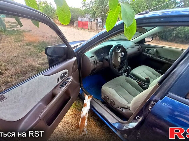 Синій Мазда 323, об'ємом двигуна 1.6 л та пробігом 0 тис. км за 2999 $, фото 5 на Automoto.ua