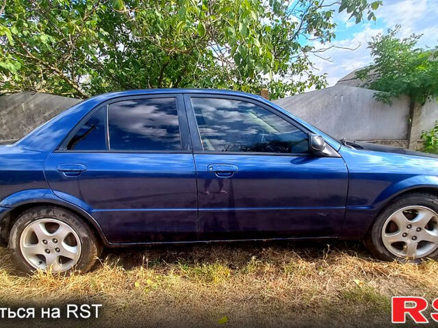 Синій Мазда 323, об'ємом двигуна 1.6 л та пробігом 0 тис. км за 2999 $, фото 2 на Automoto.ua