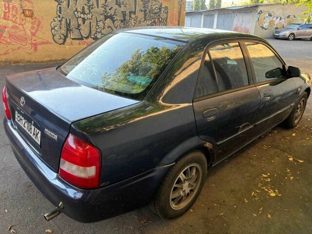 Синий Мазда 323, объемом двигателя 1.6 л и пробегом 400 тыс. км за 2200 $, фото 4 на Automoto.ua
