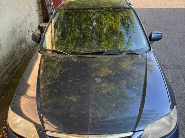 Синий Мазда 323, объемом двигателя 1.6 л и пробегом 400 тыс. км за 2200 $, фото 5 на Automoto.ua