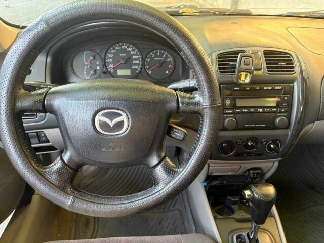 Синий Мазда 323, объемом двигателя 1.6 л и пробегом 400 тыс. км за 2200 $, фото 11 на Automoto.ua